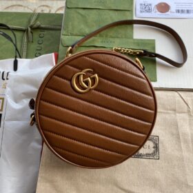 GG Marmont mini round shoulder bag